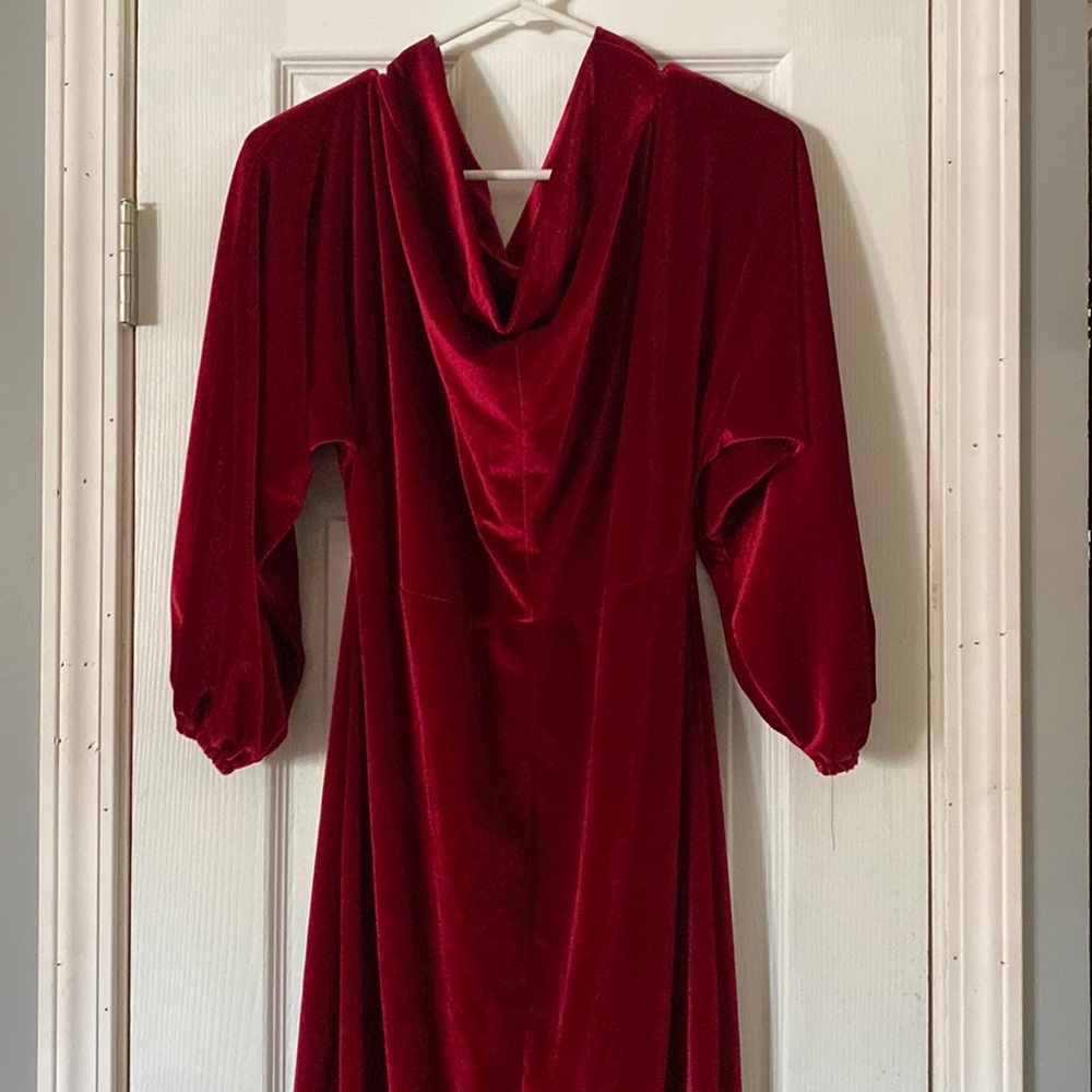 Red velvet off the shoulder dress.